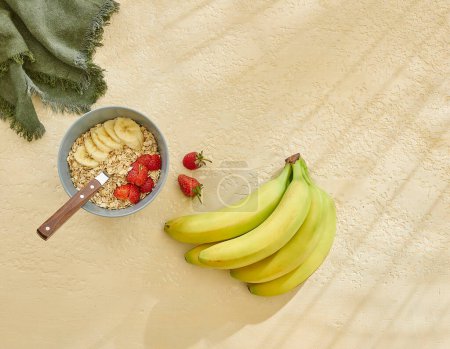 Photo for Granola and various fruits vitamins on the wooden table, yellow banana. - Royalty Free Image