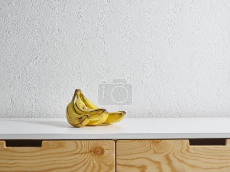 Photo for Yellow banana kitchen style, wooden table style. - Royalty Free Image