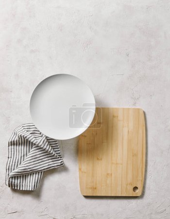 Photo for White empty plate, decorative textured background style with napkin. Up view. - Royalty Free Image
