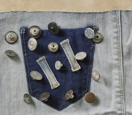 Photo for Several buttons on the jeans fabric. Up view. - Royalty Free Image