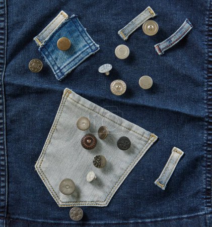 Photo for Several buttons on the jeans fabric. Up view. - Royalty Free Image