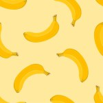 Seamless pattern with bananas on a yellow background. Vector cartoon illustration of ripe tropical fruits.