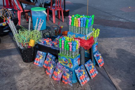Photo for Perak,Malaysia. August 2,2023: Plastic stick mini soap Bubble toy for kids on display for sale at the Waterfront playground park,Bagan Datok. - Royalty Free Image