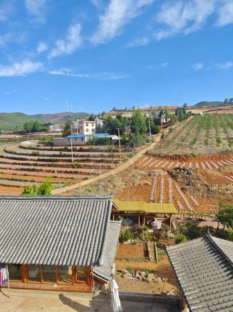 Village houses around the DongChuan,China agriculture landscape.
