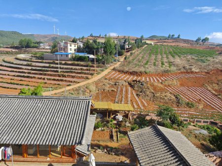 Village houses around the DongChuan,China agriculture landscape.
