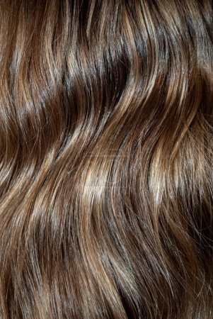 Photo for Photo of brown shiny and wavy hair, close up, details - Royalty Free Image