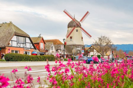 Photo for Solvang, California, USA - December 8, 2022  Windmill in Solvang, Tower Pizza on Main Street. Architecture, street view, traditional Danish Style, little Denmark in California - Royalty Free Image