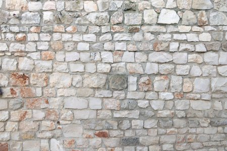 Téléchargez les photos : Abstract background of a manmade rock wall - en image libre de droit