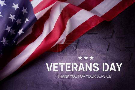Veterans day concept. Banner with American Flag on the grey background with empty space for text.