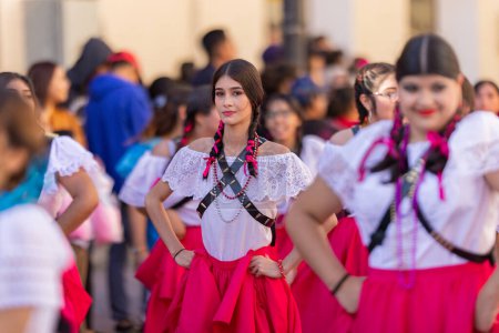 Photo for Matamoros, Tamaulipas, Mexico - November 26, 2022: The Desfile del 20 de Noviembre, Dancers dress up as adelitas, from the Normal school Lic. J. Guadalupe Mainero, performing at the parade - Royalty Free Image