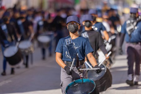 Photo for Matamoros, Tamaulipas, Mexico - November 26, 2022: The Desfile del 20 de Noviembre, Marching band performing at the parade - Royalty Free Image