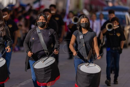 Photo for Matamoros, Tamaulipas, Mexico - November 26, 2022: The Desfile del 20 de Noviembre, Members of the CBTis  275 marching band performing at the parade - Royalty Free Image