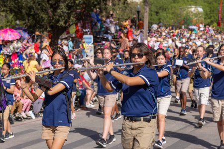 Photo for San Antonio, Texas, USA - April 8, 2022: The Battle of the Flowers Parade, Members of the Randolph High School Marching Band performing at the parade - Royalty Free Image