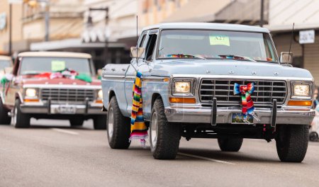 Photo for Brownsville, Texas, USA - February 26, 2022: Charro Days Grand International Parade, a group of Classic Ford trucks part of the parade - Royalty Free Image