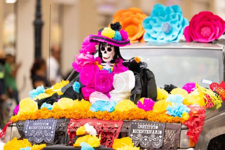 Photo for Matamoros, Tamaulipas, Mexico - November 1, 2022: Dia de los Muertos Parade, Jeep carries day of the dead decorations on it's hood during the parade - Royalty Free Image