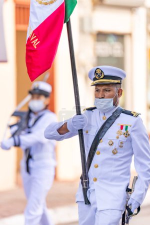 Photo for Matamoros, Tamaulipas, Mexico - September 16, 2022: Desfile 16 de Septiembre, Mexican Navy personel escorting the mexican flag - Royalty Free Image
