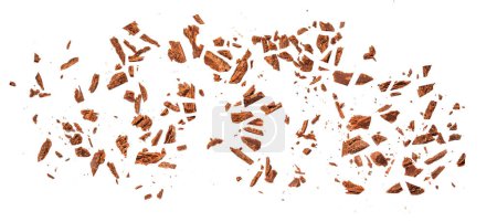 Téléchargez les photos : Cracked broken chocolate isolated on white background. Dark bitter  Chocolate chips pieces Top view. Flat lay - en image libre de droit