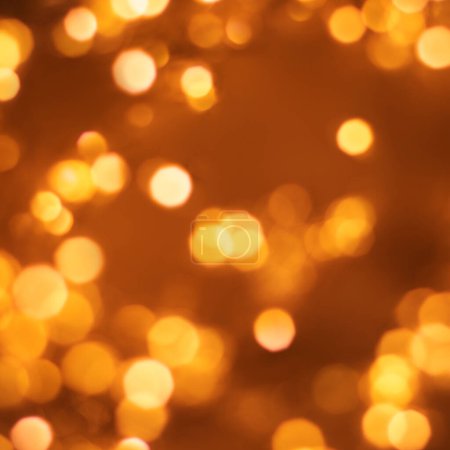 Foto de Christmas golden lights Background. Abstract twinkled bright bokeh defocused light - Imagen libre de derechos