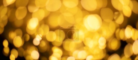 Photo for Christmas golden lights Background. Abstract twinkled bright bokeh defocused light - Royalty Free Image