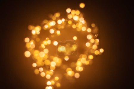 Photo for Christmas golden lights Background. Abstract twinkled bright bokeh defocused light - Royalty Free Image
