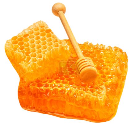 Foto de Palillo de miel y panal aislado sobre fondo blanco, vista superior. - Imagen libre de derechos