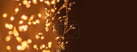 Foto de Christmas golden lights Background. Abstract twinkled bright bokeh defocused light - Imagen libre de derechos