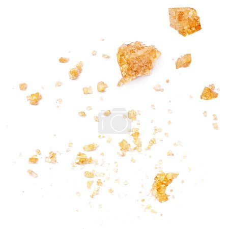 Photo for Brown sugar Crumbs isolated on white background, top view. Sweet Granulated Cane sugar Flat lay - Royalty Free Image