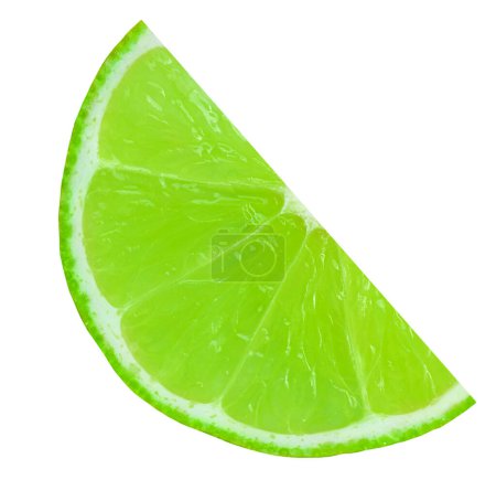 Foto de Lime slice isolated on white background. Lime citrus fruit closeup - Imagen libre de derechos