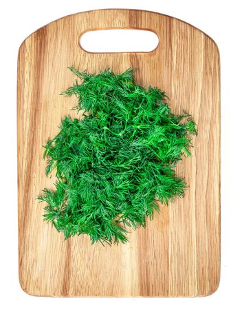 Photo for Chopped Parsley closeup on rustic wooden board isolated on white background. Healthy vegetarian food top vie - Royalty Free Image