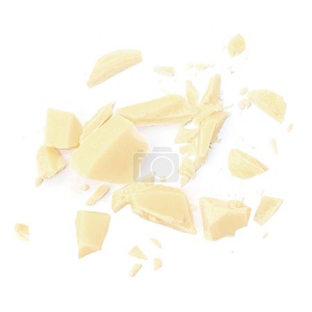 Photo for White milk chocolate chunks isolated on white background. Chocolate pieces with  crumbs Top view. Flat la - Royalty Free Image
