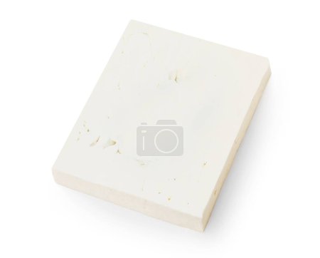 Foto de Piezas de queso Feta sobre fondo blanco aislado, vista superior. Fesh Greek feta cheese block close u - Imagen libre de derechos