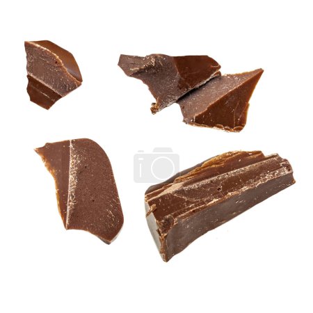 Photo for Flying Dark chocolate pieces isolated on white background. Broken chocolate chunks  Top view. Flat la - Royalty Free Image