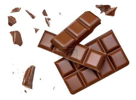 Photo for Milk chocolate explosion isolated on white background. Chocolate broken into pieces in the air with shatters, crumbs  and chocolate bar close up. Top view. - Royalty Free Image