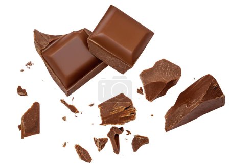 Photo for Milk chocolate chunks isolated on white background. Crumbs, shavings and Flying Chocolate pieces Top view. - Royalty Free Image