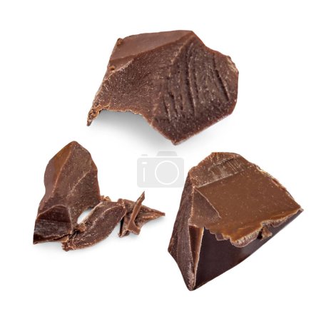 Photo for Broken milk chocolate pieces isolated. Dark Chocolate pieces with crumbs  on white background - Royalty Free Image