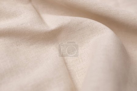Photo for Natural linen fabric texture. Rough crumpled burlap background. Selective focus - Royalty Free Image