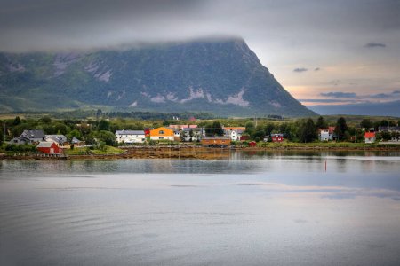 Photo for Risoeyhamn is a village in Andoey Municipality in Nordland county, Norway. The village is located on the southern part of the island of Andoeya. - Royalty Free Image