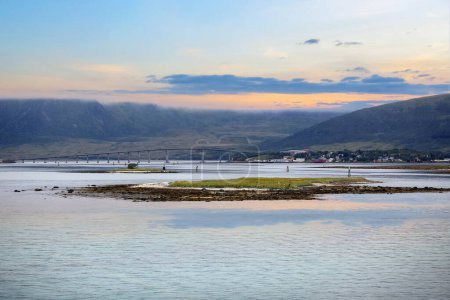 Photo for Risoeyhamn is a village in Andoey Municipality in Nordland county, Norway. The village is located on the southern part of the island of Andoeya. - Royalty Free Image