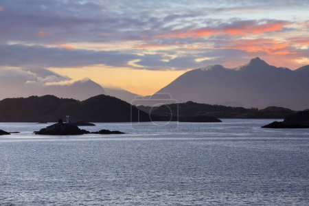 Photo for Summer sunset at the Lofoten islands, the photo taken from cruise liner Hurtigruta - Royalty Free Image