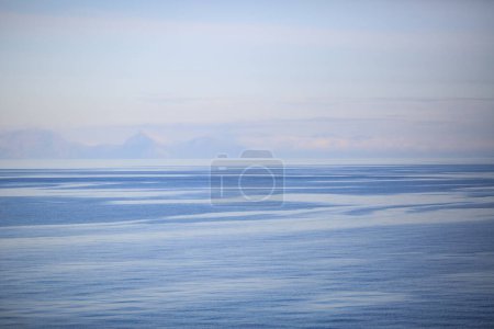 Photo for Summer  fogggy day at  Lofoten islands, the photo taken from cruise liner Hurtigruta - Royalty Free Image