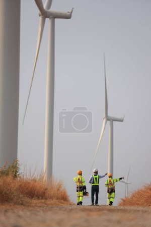 Photo for Wind turbine manager and technician work audit, service or maintenance, Green and renewable energy concept - Royalty Free Image