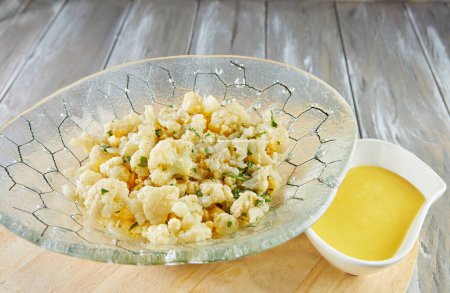 Photo for Cauliflower salad with wine vinegar and fresh herbs. - Royalty Free Image