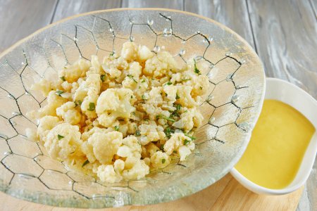 Photo for Cauliflower salad with wine vinegar and fresh herbs. - Royalty Free Image