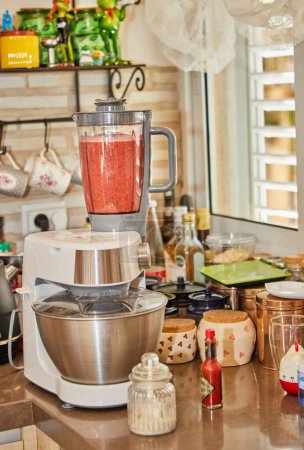 Photo for Experienced professional chef skillfully prepares delicious gazpacho in a blender at a modern home kitchen, showcasing expertise and culinary mastery. - Royalty Free Image