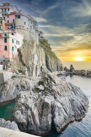 Photo for Hanging houses on a famous beach in the Italian town of "CINQUE TERRE" , northwest italian coast - Royalty Free Image