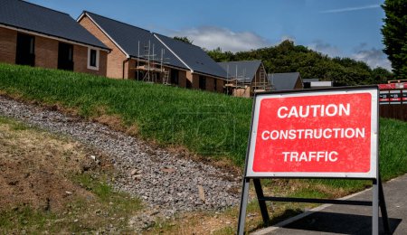Photo for Caution Construction Traffic sign on construction site, Cotswolds, England, United Kingdom - Royalty Free Image