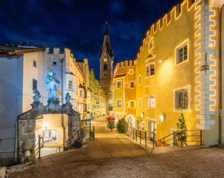 The colorful Bressanone old town during Christmas time in the evening, Trentino Alto Adige, northern Italy.