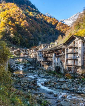 Photo for The beautiful village of Rassa, during fall season, in Valsesia (Sesia Valley). Province of Vercelli, Piedmont, Italy. - Royalty Free Image