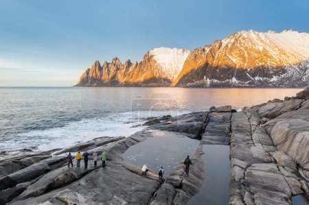 Photo for Rock Devil's Jaw. Norwey, island Senja Snow covered mountain range on coastline in winter, Norway. Panoramic view landscape nordic snow cold winter - Royalty Free Image