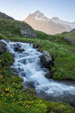 Photo for Panorama of Mt. Schreckhorn and Wetterhorn. Popular tourist attraction. Dramatic and picturesque scene. Place location Bachalpsee in the Swiss Alps Bernese Oberland, Grindelwald, Europe Flowing stream - Royalty Free Image